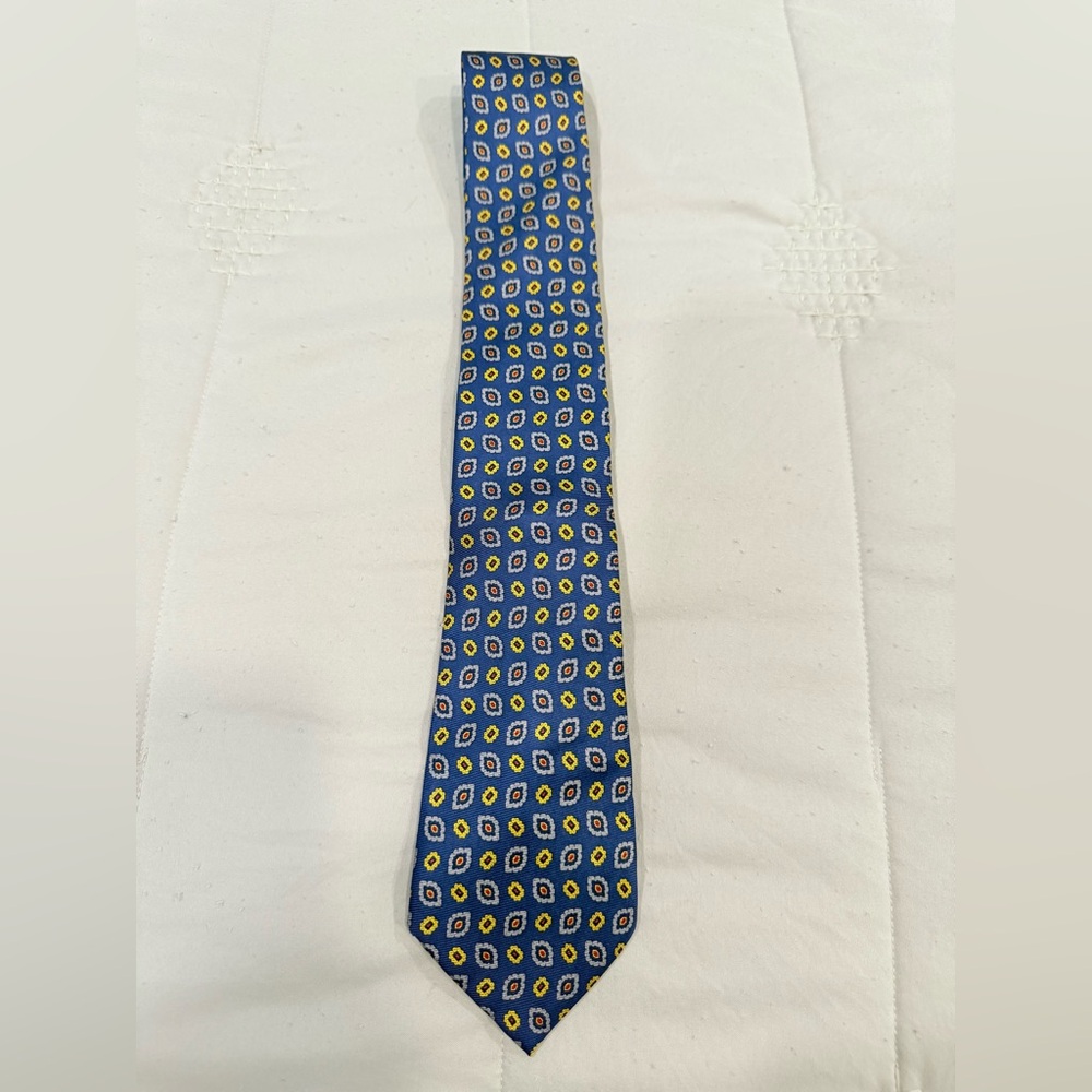 Banana Republic silk tie. Navy background with red, gold, & light blue design